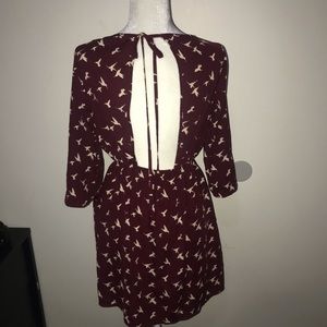 Necessary open back freedom bird dress